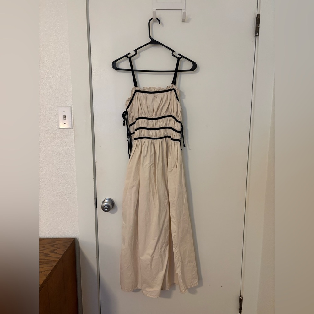 Elegant Cream Maxi Dress with Black Accents